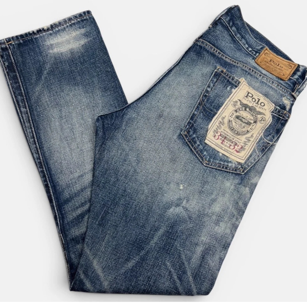Varick Slim Straight Distressed Jeans