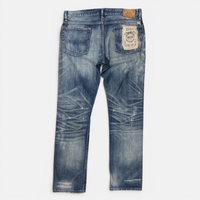 Varick Slim Straight Distressed Jeans